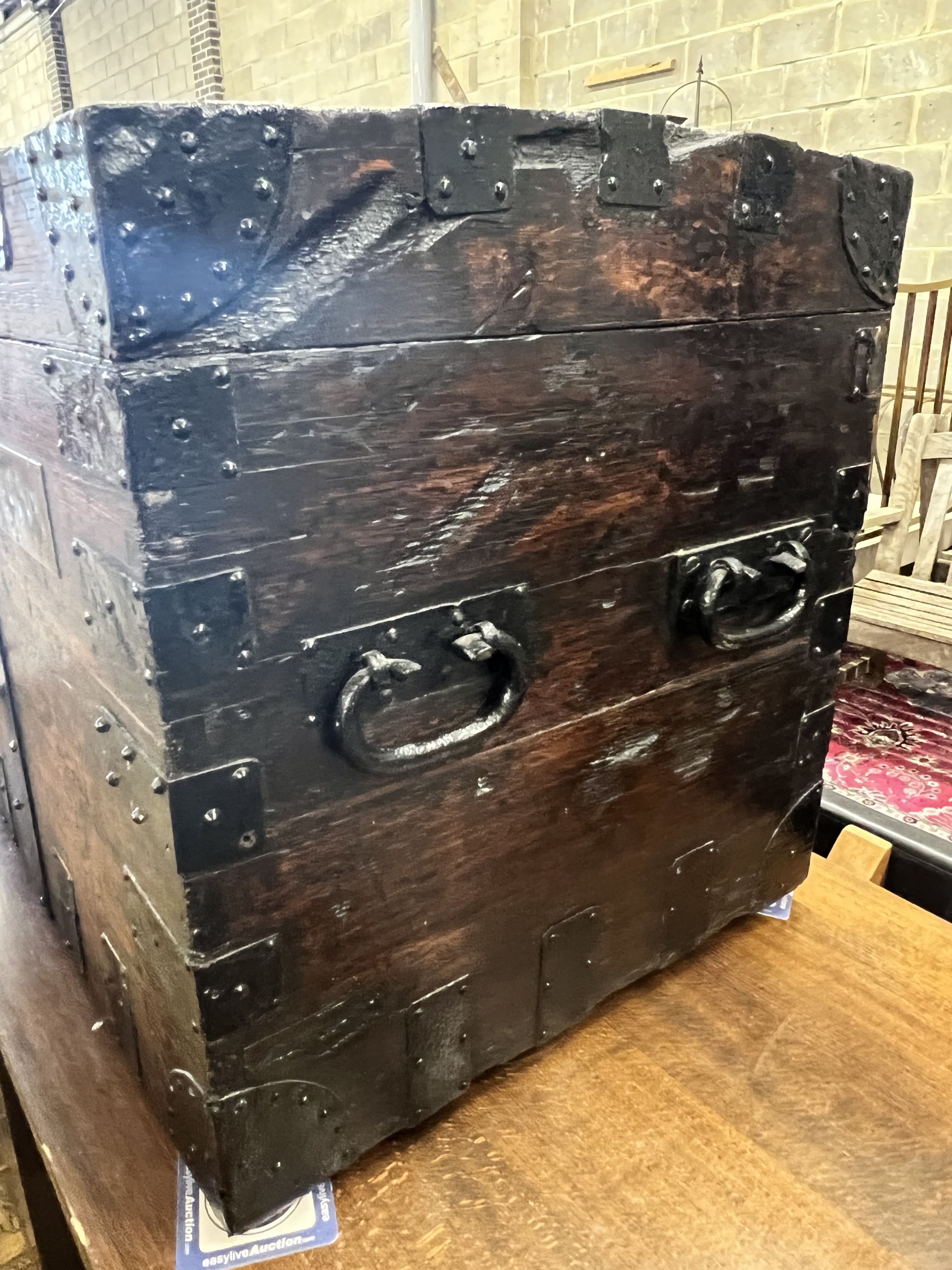 A Victorian iron bound oak silver chest, with engraved brass plaque 'Her Majesty Mercury Candelabrum No.17', width 81cm depth 56cm height 62cm